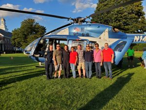 Image of Enfield Republicans in front of a helicopter at National Night Out 2023